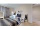 Bedroom featuring a comfortable bed, dresser with mirror, and natural light at 3425 Fledgling Dr, North Las Vegas, NV 89084