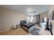 Bright bedroom boasts a modern bed, sleek furniture, soft gray accents, and ample lighting for a serene retreat at 3425 Fledgling Dr, North Las Vegas, NV 89084