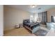 Stylish bedroom with contemporary furnishings, soft lighting, and a cozy atmosphere at 3425 Fledgling Dr, North Las Vegas, NV 89084