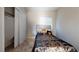 Cozy bedroom with a comfortable bed, stylish accents, and a closet providing storage at 3425 Fledgling Dr, North Las Vegas, NV 89084