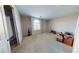 Large bedroom with a window, closet, and neutral carpet, providing a blank canvas for personalized decor at 3425 Fledgling Dr, North Las Vegas, NV 89084