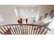 Grand foyer with soaring ceilings, elegant staircase, and decorative accents at 3425 Fledgling Dr, North Las Vegas, NV 89084