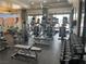 Community gym featuring modern treadmills, weight machines, free weights, and large windows for natural light at 3425 Fledgling Dr, North Las Vegas, NV 89084