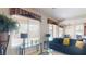 Bright living room with large windows overlooking the pool area at 3425 Fledgling Dr, North Las Vegas, NV 89084