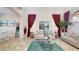 Bright living room features soaring ceilings, comfortable seating, and an abundance of natural light at 3425 Fledgling Dr, North Las Vegas, NV 89084