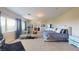 Spacious main bedroom with natural light and plush carpeting, creating a serene retreat at 3425 Fledgling Dr, North Las Vegas, NV 89084