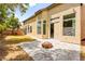 Large backyard showcasing a fire pit, stucco exterior, and ample space for entertaining at 4007 W Red Coach Ave, North Las Vegas, NV 89031