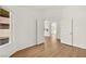Spacious bedroom with hardwood floors, ample natural light, and double doors at 4007 W Red Coach Ave, North Las Vegas, NV 89031