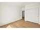 Bright bedroom features hardwood flooring and a double-door closet at 4007 W Red Coach Ave, North Las Vegas, NV 89031