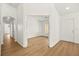 Welcoming entryway with hardwood floors and access to multiple rooms in the house at 4007 W Red Coach Ave, North Las Vegas, NV 89031