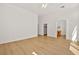 Large main bedroom with hardwood floors and an ensuite bathroom at 4007 W Red Coach Ave, North Las Vegas, NV 89031
