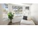 Relaxing bedroom nook with a comfortable chaise lounge overlooking the pool area at 4016 Tyler William Ln, Las Vegas, NV 89130