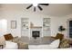 Comfortable living room with a fireplace, built-in cabinets, and stylish seating at 4016 Tyler William Ln, Las Vegas, NV 89130