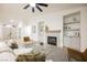 Bright and airy living room with a modern fireplace, built-in shelving, and stylish decor at 4016 Tyler William Ln, Las Vegas, NV 89130