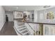 Bright hallway showcasing a chandelier, staircase, and stylish interior design at 44 Tamarron Cliffs St, Las Vegas, NV 89148