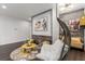 Stylish living room features a hanging chair, accent wall, and modern decor at 44 Tamarron Cliffs St, Las Vegas, NV 89148