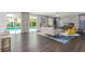 Spacious open-concept living area with pool view, perfect for indoor-outdoor living at 44 Tamarron Cliffs St, Las Vegas, NV 89148