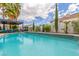 Sparkling pool with elegant water feature and covered patio, ideal for relaxation and outdoor enjoyment at 44 Tamarron Cliffs St, Las Vegas, NV 89148