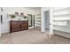 This walk-in closet is expansive and features custom shelves, rods, and abundant storage solutions at 44 Tamarron Cliffs St, Las Vegas, NV 89148