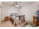Comfortable bedroom includes a ceiling fan and plantation shutters at 5978 Autumn Harvest Ave, Las Vegas, NV 89142