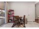 Dining area featuring a breakfast nook and convenient backyard access at 5978 Autumn Harvest Ave, Las Vegas, NV 89142
