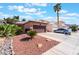 Attractive single-story home with a well-maintained front yard and desert landscaping at 5978 Autumn Harvest Ave, Las Vegas, NV 89142