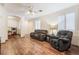 Spacious living room with hardwood floors and ample natural light at 5978 Autumn Harvest Ave, Las Vegas, NV 89142