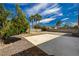 Spacious backyard featuring desert landscaping at 6128 Casper Sands Ct, North Las Vegas, NV 89031