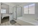 Bright bathroom with a shower and separate soaking tub at 6128 Casper Sands Ct, North Las Vegas, NV 89031