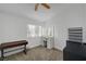 Bright bedroom with ample natural light and vanity at 6128 Casper Sands Ct, North Las Vegas, NV 89031