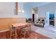 Combined dining and living space offering a versatile layout for modern living at 6222 Eliza Ln, North Las Vegas, NV 89031