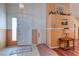 Inviting foyer with tile and wood floors, leading to the living areas and bedrooms at 6222 Eliza Ln, North Las Vegas, NV 89031