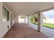 Expansive covered patio offering brick flooring, exterior access and view of the yard at 6222 Eliza Ln, North Las Vegas, NV 89031