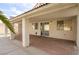 Covered patio with brick flooring and natural light at 6222 Eliza Ln, North Las Vegas, NV 89031