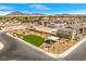 Aerial view of community featuring landscaped common area and mountain views at 6270 Blood Lily Ave, Las Vegas, NV 89122