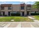 Well-maintained townhome exteriors with manicured lawns and desert-friendly landscaping at 6442 Ironbark Ln, Las Vegas, NV 89107