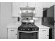 Modern kitchen with new stainless steel appliances and marble counter tops at 6442 Ironbark Ln, Las Vegas, NV 89107