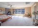 Bright bedroom with lots of natural light, ceiling fan, and stylish furnishings at 7125 Mountain Den Ave, Las Vegas, NV 89179