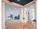 Open-concept foyer with decorative pillars and view to living room at 7125 Mountain Den Ave, Las Vegas, NV 89179