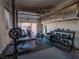 The home gym in the garage offers convenient workouts and storage at 7125 Mountain Den Ave, Las Vegas, NV 89179