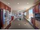 Open kitchen flowing into the living area with high-end stainless steel appliances at 7125 Mountain Den Ave, Las Vegas, NV 89179
