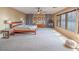 Spacious main bedroom featuring ample natural light and modern decor at 7125 Mountain Den Ave, Las Vegas, NV 89179
