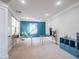 Spacious home office featuring plush carpet, a modern color scheme, and natural light at 7125 Mountain Den Ave, Las Vegas, NV 89179
