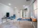 Bright, spacious office with two workstations, neutral carpet, and a blue storage cabinet at 7125 Mountain Den Ave, Las Vegas, NV 89179