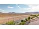Desert mountain view from the home featuring a view over the neighborhood street. Stunning scenery! at 7125 Mountain Den Ave, Las Vegas, NV 89179