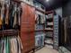 Organized walk-in closet with custom shelving, drawers, and storage solutions at 7125 Mountain Den Ave, Las Vegas, NV 89179
