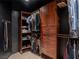 Custom walk-in closet with adjustable shelves and hanging rods for optimal organization at 7125 Mountain Den Ave, Las Vegas, NV 89179