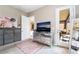 Bedroom featuring a dresser with a mirror, rug, and access to the patio at 715 Drammatico Pl, Henderson, NV 89011