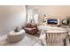 Bright office space with a desk, couch, and bright natural light at 715 Drammatico Pl, Henderson, NV 89011