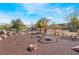 Community playground with disc swings and a slide, perfect for Gathering fun at 715 Drammatico Pl, Henderson, NV 89011